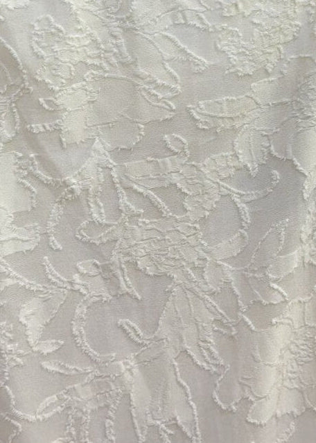 Detailed jacquard fabric texture of A-line adjustable straps maxi dress