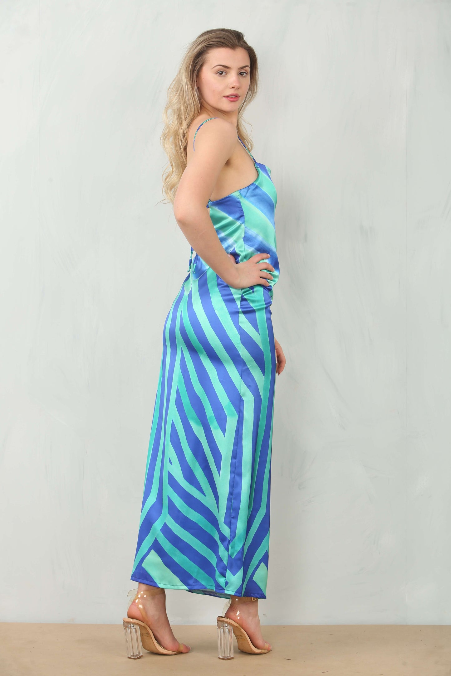 Side look of satin bodycon dress with cowl neck