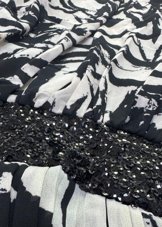 Fabric of chiffon fabric texture and neckline detail on one shoulder evening mini dress