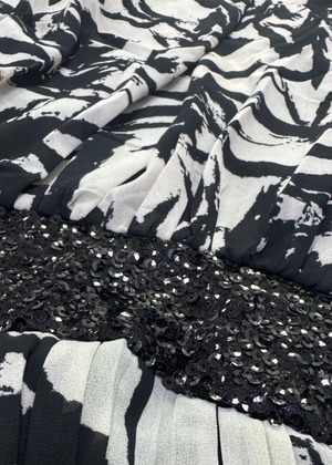 Fabric of chiffon fabric texture and neckline detail on one shoulder evening mini dress