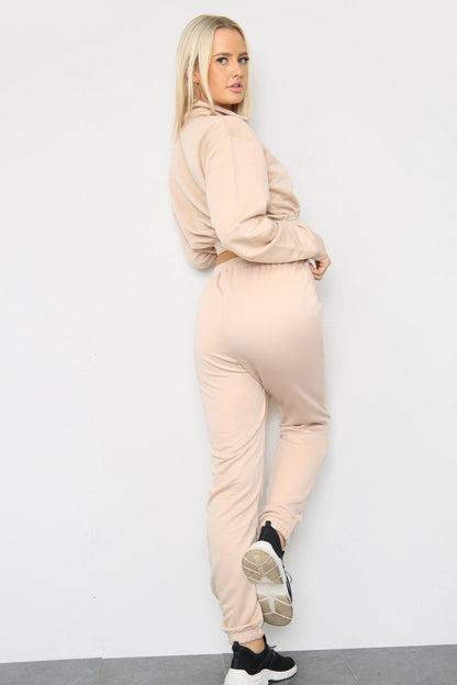 Back view of long sleeve zipper crop top with oversized matching joggers