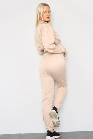 Back view of long sleeve zipper crop top with oversized matching joggers