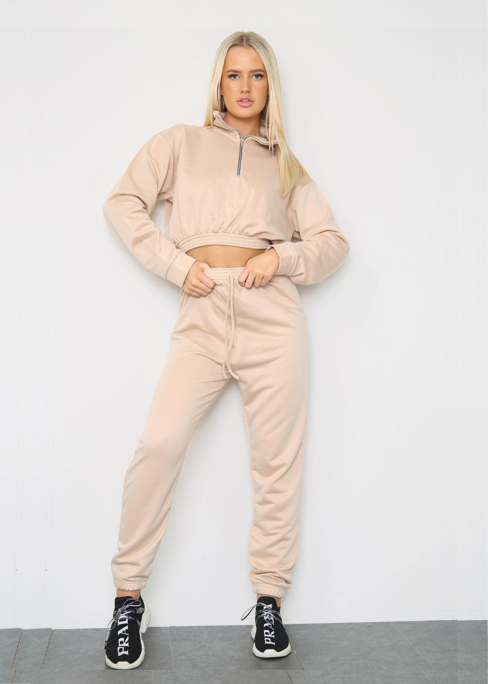 Front view of long sleeve zipper crop top with oversized matching joggers