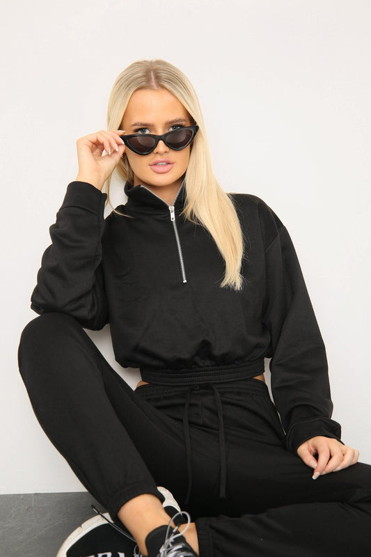Right side view of long sleeve zipper crop top with oversized matching joggers
