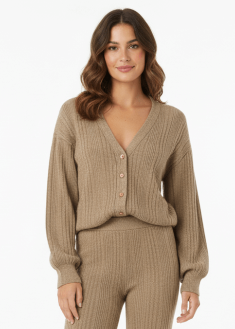 Closeup of V-neck cardigan and wide-leg trousers co-ord set, front details