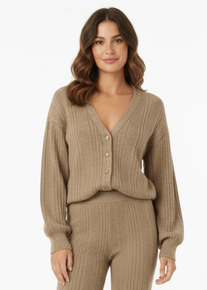 Closeup of V-neck cardigan and wide-leg trousers co-ord set, front details