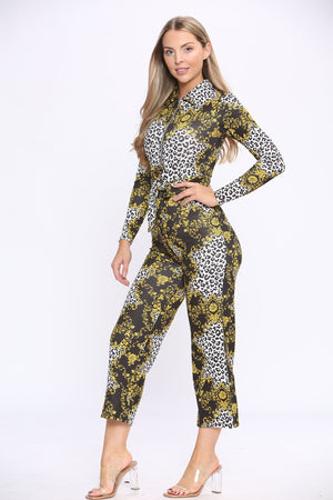 Closeup of wide leg fit statement chain print long sleeve jumpsuit, front detail